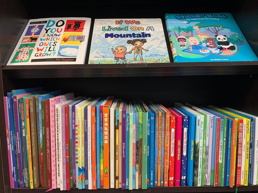 A bookshelf of children's books. These books were printed by sure print and design and has kids books. Kids will love these book as they are fun and easy to read. 